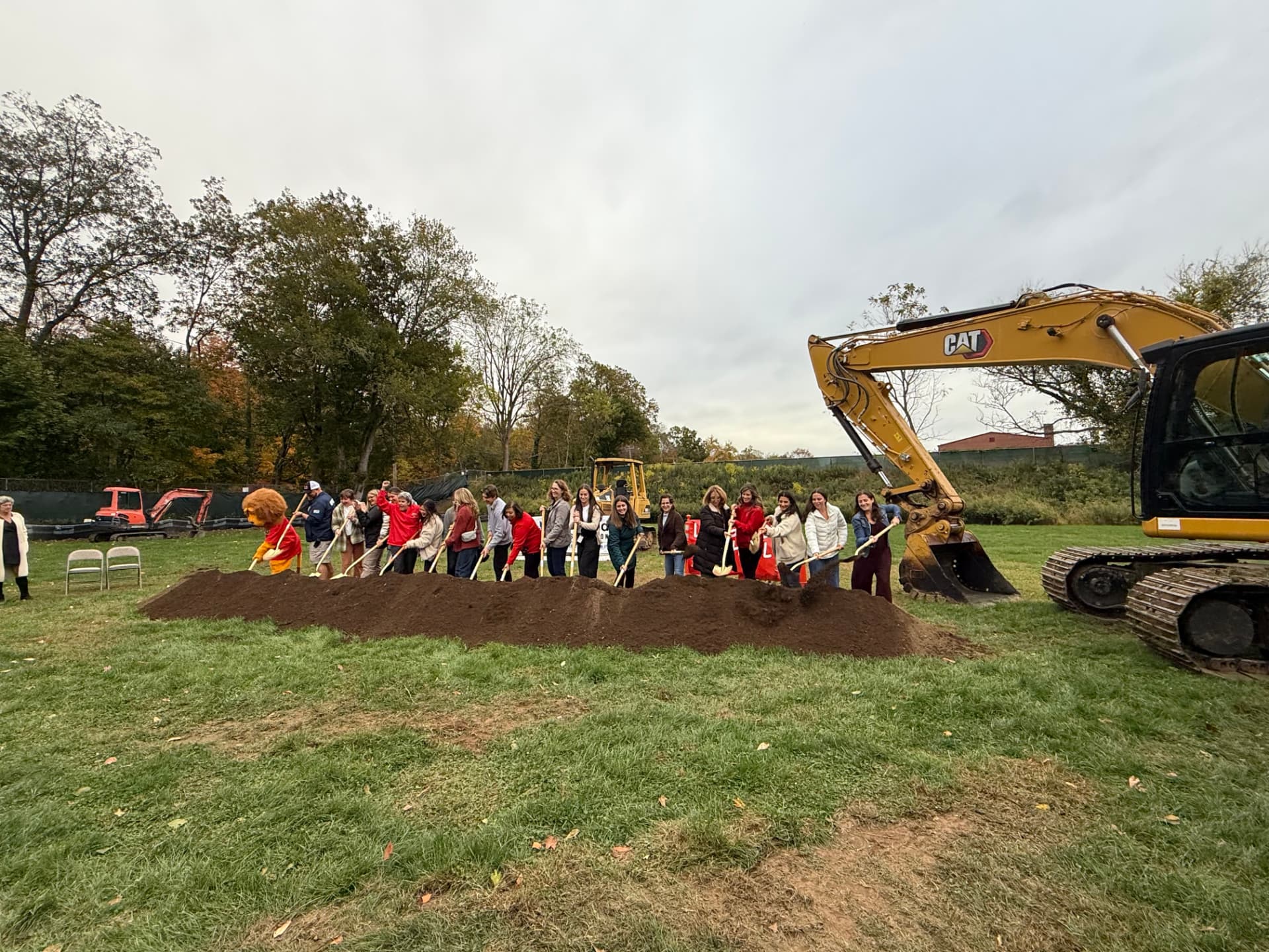 October 2025 — Long Lots families, PTA volunteers and Leo the Lion celebrate the start of construction