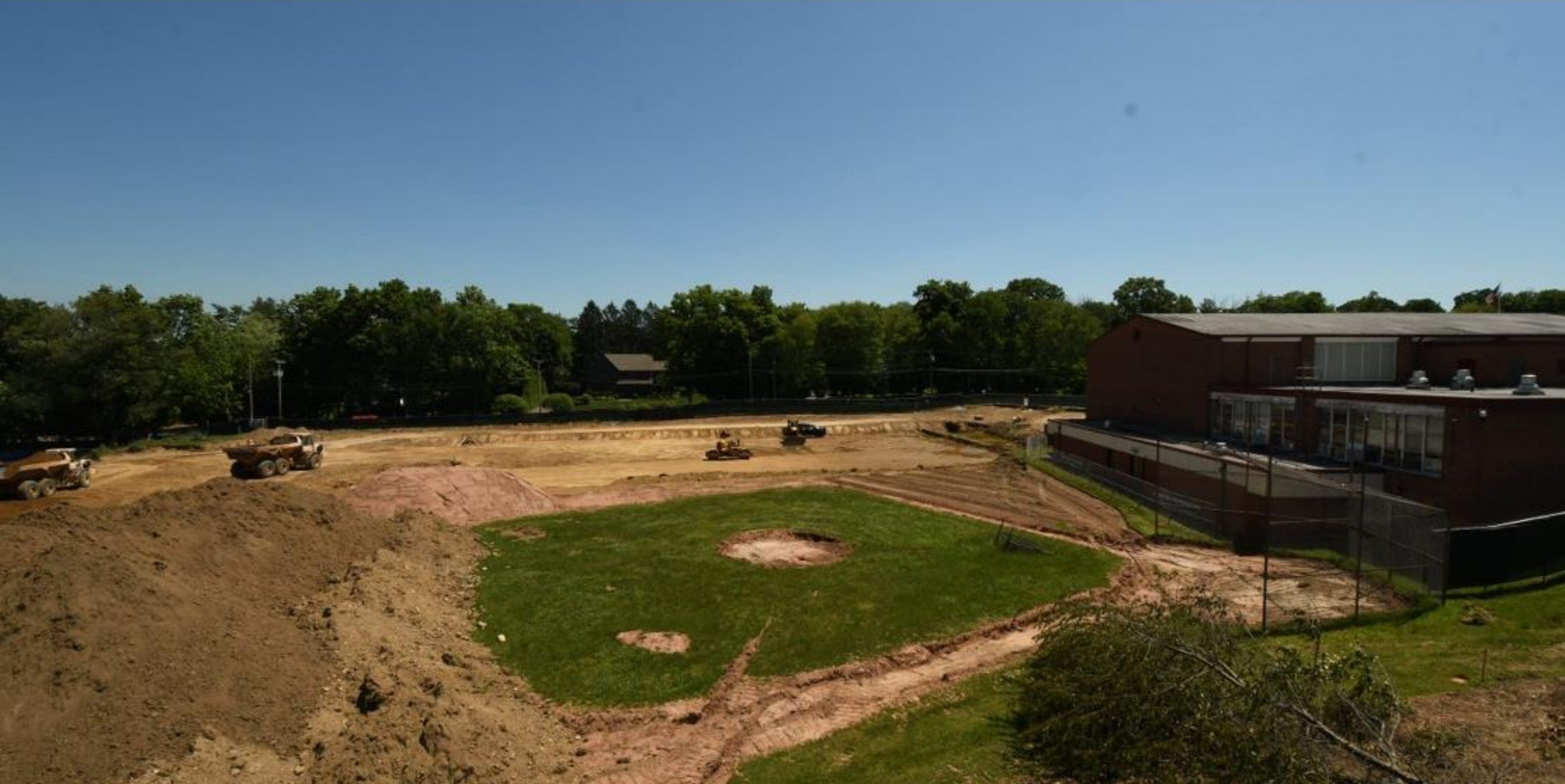 May 2026 — Earthwork underway at existing baseball field. 